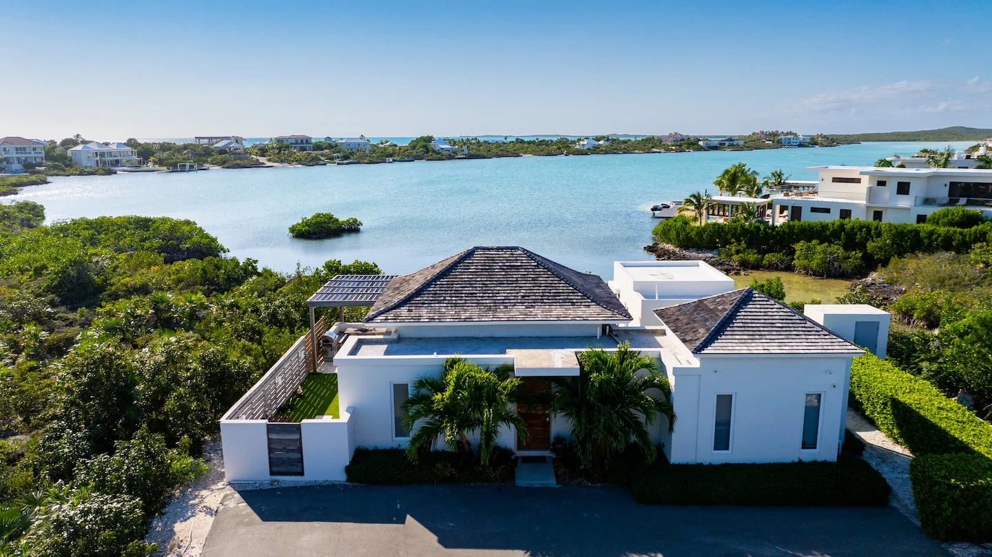 An aerial view of Vista Cove and its Chalk Sound waterfront setting
